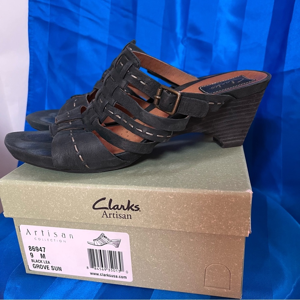 Clarks Black Leather Mules with a hand stiched detail, stacked 3” wedge